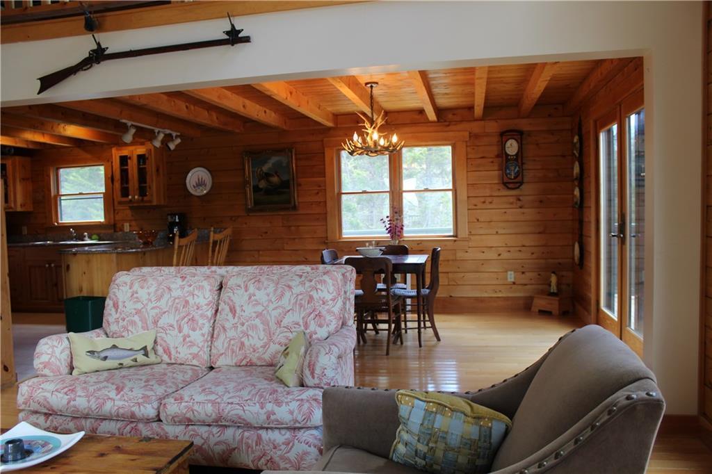 149 Chambers Point Road Roque Bluffs, ME 04654 - Photo 20 of 35 Living room looking towards dining area.