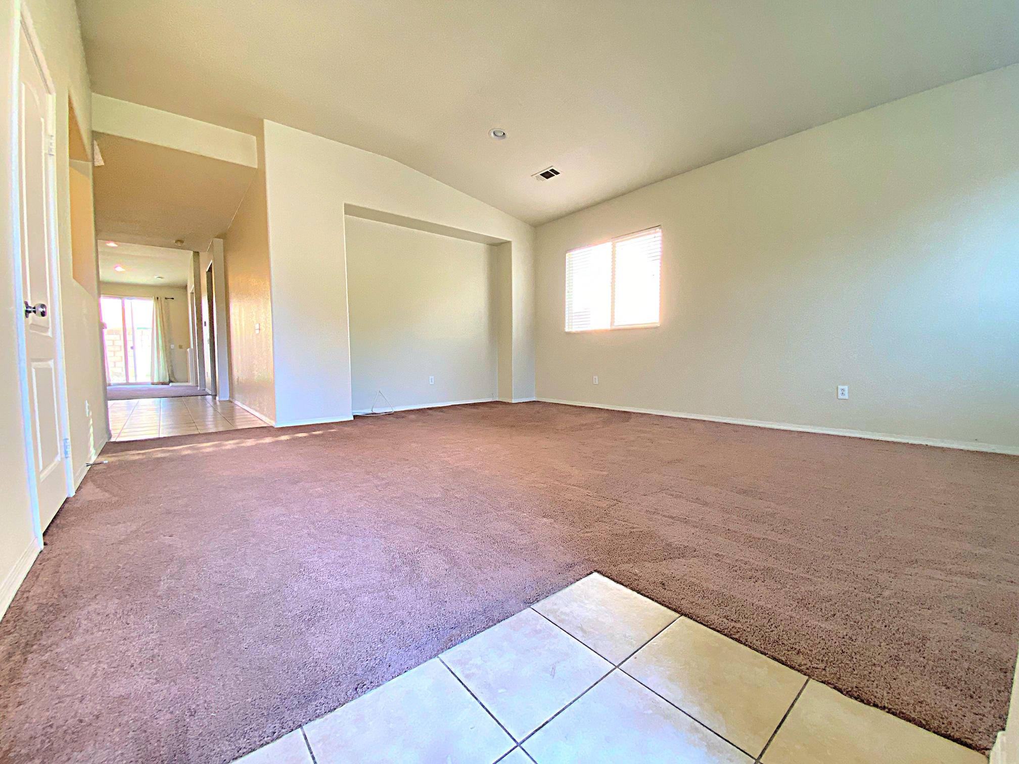 2751 Garnet Lane Lancaster, CA 93535 - Photo 12 of 46 an empty room with windows