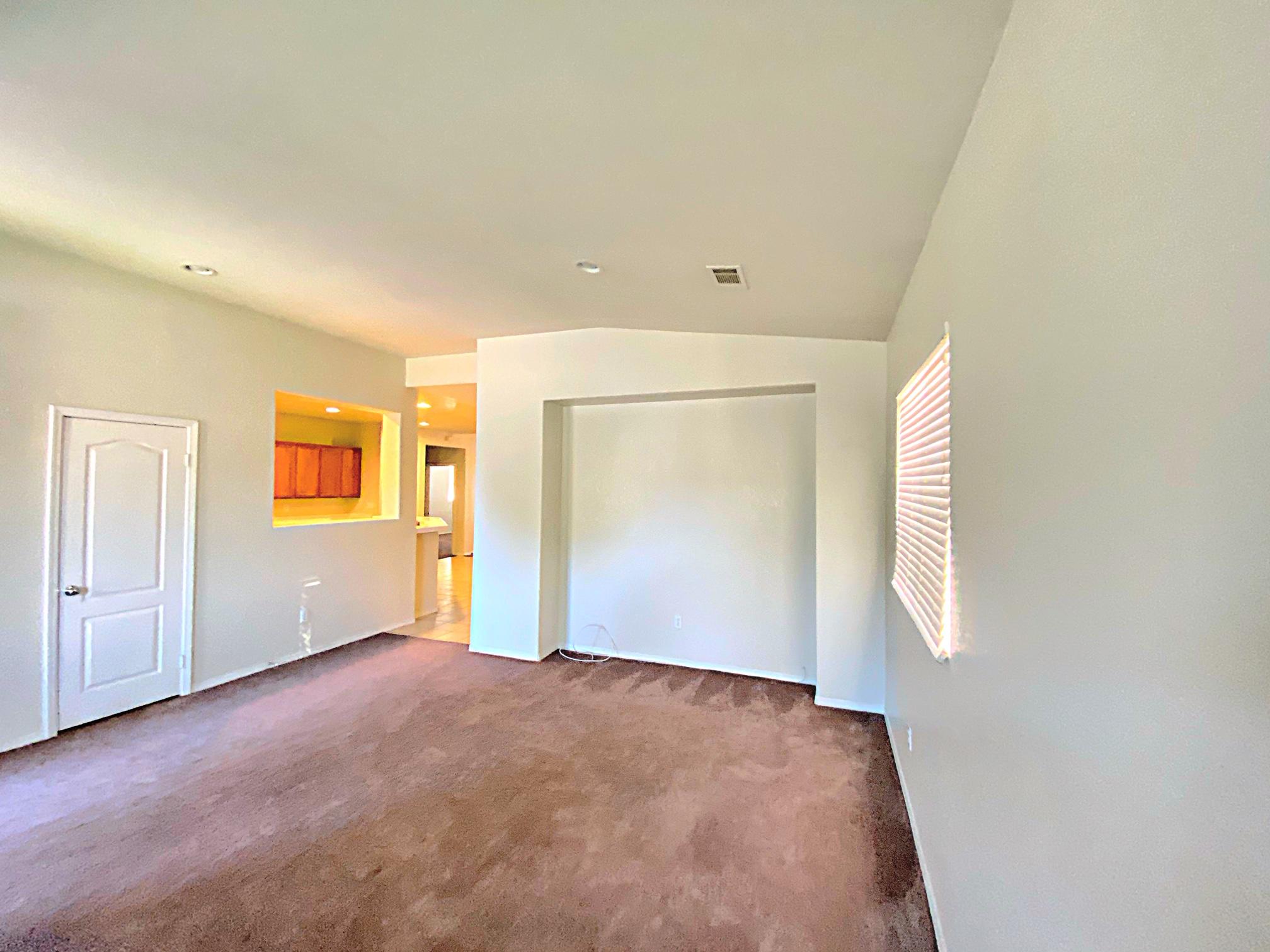2751 Garnet Lane Lancaster, CA 93535 - Photo 13 of 46 an empty room with windows and closet