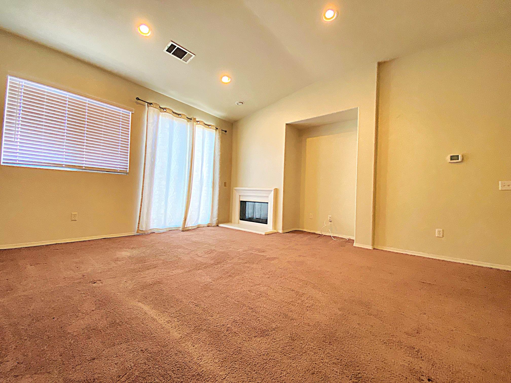 2751 Garnet Lane Lancaster, CA 93535 - Photo 17 of 46 a view of an empty room with a window