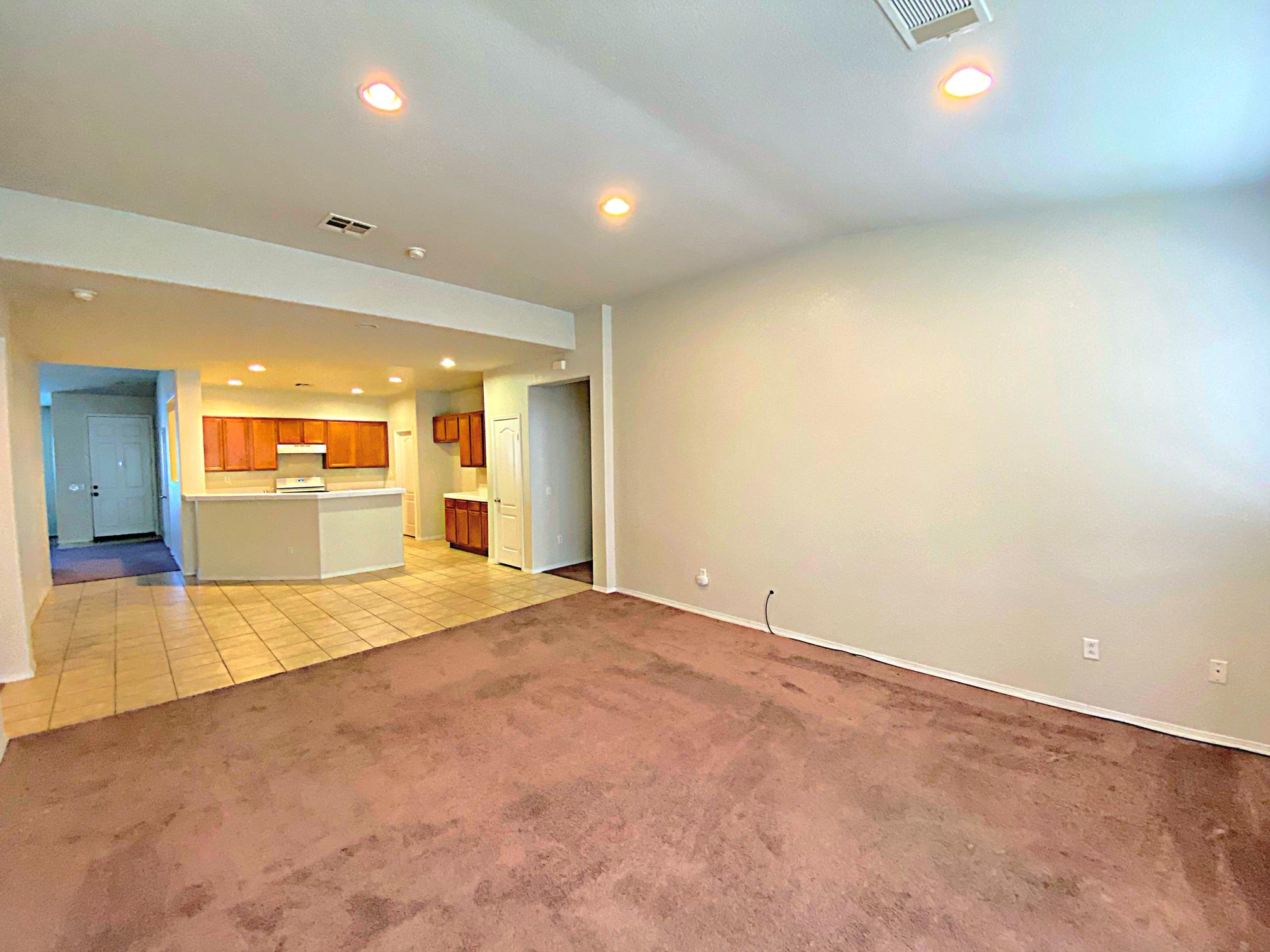 2751 Garnet Lane Lancaster, CA 93535 - Photo 18 of 46 an empty room with a empty room and glass door