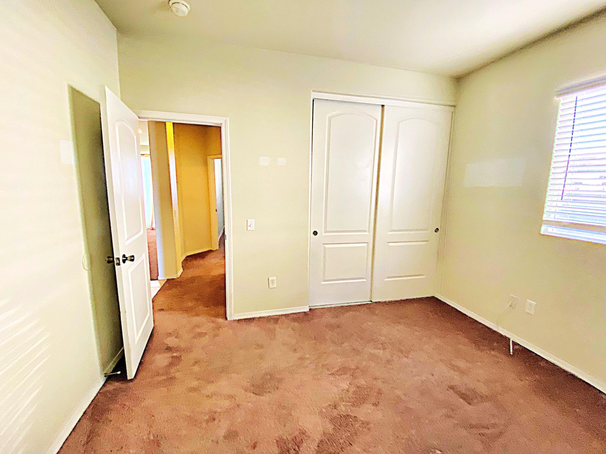 2751 Garnet Lane Lancaster, CA 93535 - Photo 30 of 46 an empty room with windows