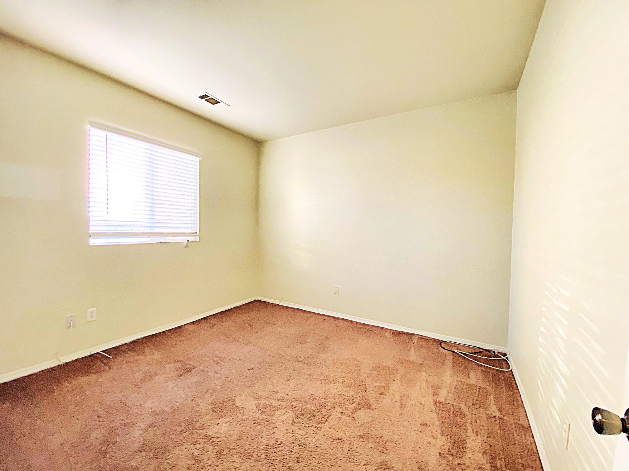 2751 Garnet Lane Lancaster, CA 93535 - Photo 31 of 46 an empty room with a window
