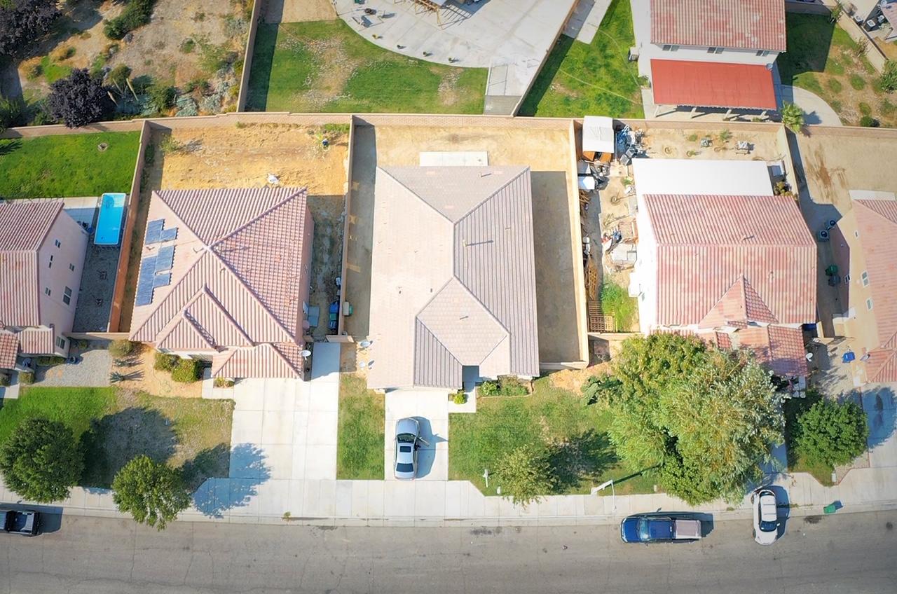 2751 Garnet Lane Lancaster, CA 93535 - Photo 41 of 46 an aerial view of residential houses with outdoor space and parking