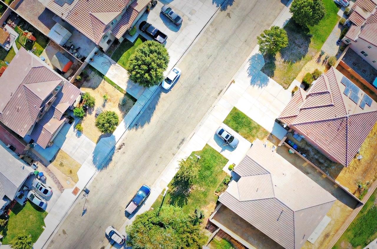 2751 Garnet Lane Lancaster, CA 93535 - Photo 6 of 46 an aerial view of a house with a yard and potted plants