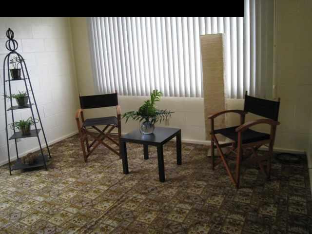 2040 L Kula Road Kula, HI 96790 - Photo 3 of 30 a view of a workspace with furniture and a window