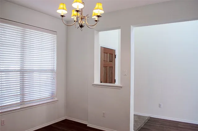 a view of dining room with wooden floor