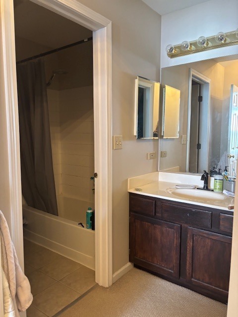 8167 Ripple Ridge, Unit 8167 Darien, IL 60561 - Photo 6 of 9 a bathroom with a double vanity sink and a mirror