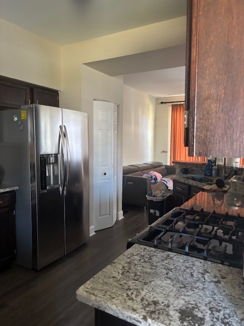 8167 Ripple Ridge, Unit 8167 Darien, IL 60561 - Photo 8 of 9 a kitchen with refrigerator and window