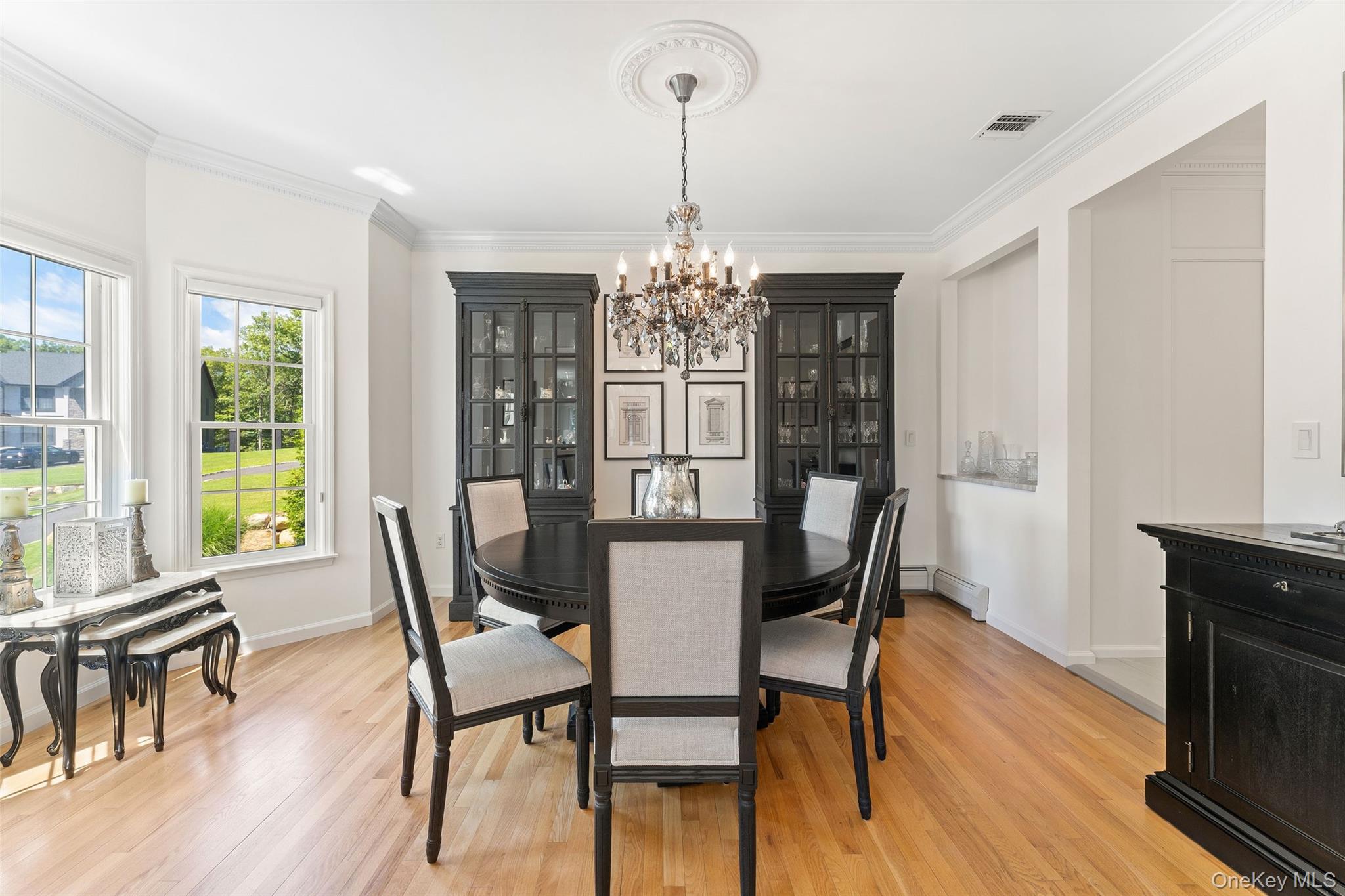 22 Perrin's Peak Road Stony Point, NY 10980 - Photo 24 of 47 Dining room featuring a chandelier, ornamental molding, and light wood-style floors