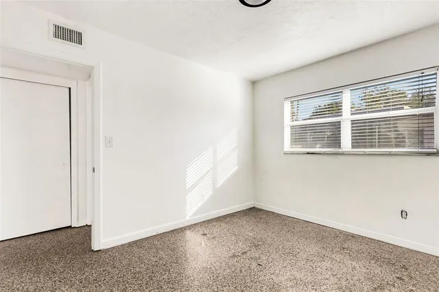 an empty room with a window