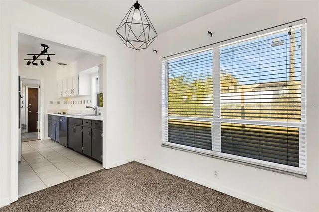 a view of a kitchen with a sink and dishwasher