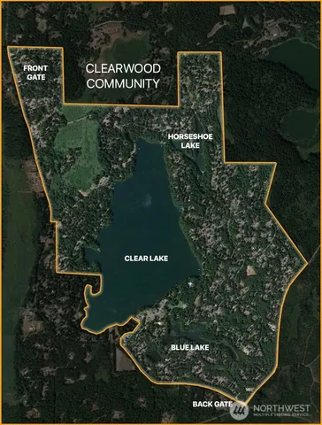 a view of a lake with a yard