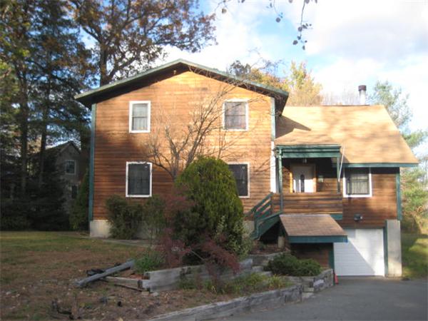 119 Pecunit Street Canton, MA 02021 - Photo 1 of 28 a view of a house with a yard