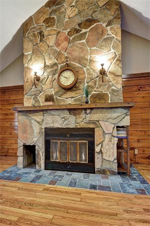 119 Pecunit Street Canton, MA 02021 - Photo 11 of 28 a view of a fireplace with a wooden floor