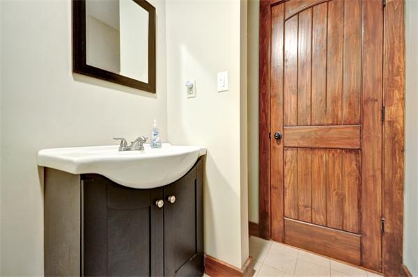 119 Pecunit Street Canton, MA 02021 - Photo 15 of 28 a bathroom with a sink a mirror and a window