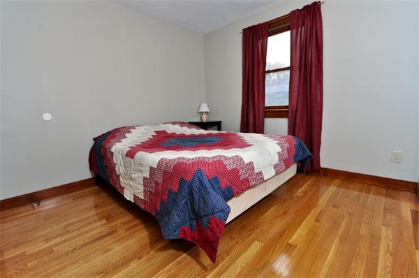 119 Pecunit Street Canton, MA 02021 - Photo 17 of 28 a bedroom with a bed and window