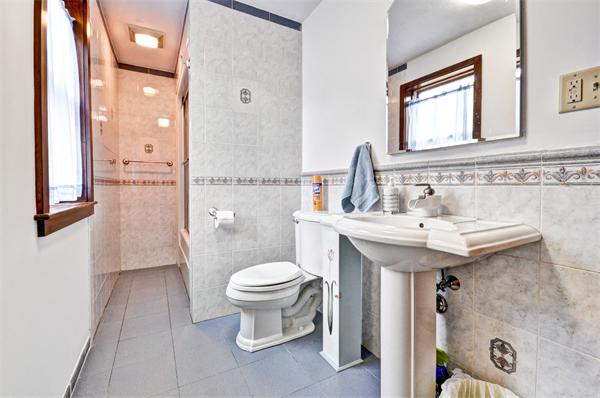 119 Pecunit Street Canton, MA 02021 - Photo 18 of 28 a bathroom with a sink toilet and shower