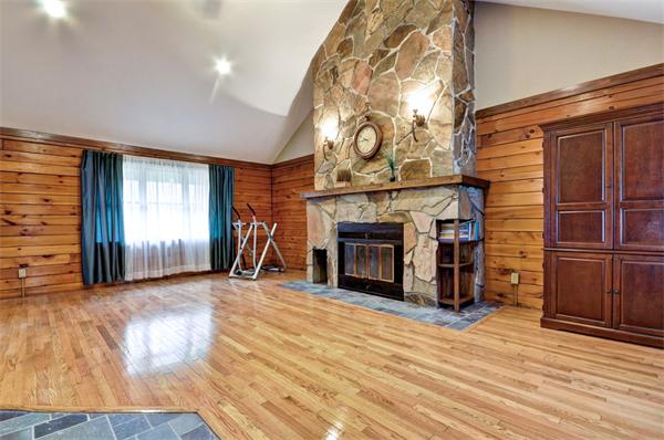 119 Pecunit Street Canton, MA 02021 - Photo 8 of 28 a view of a livingroom with a fireplace and window