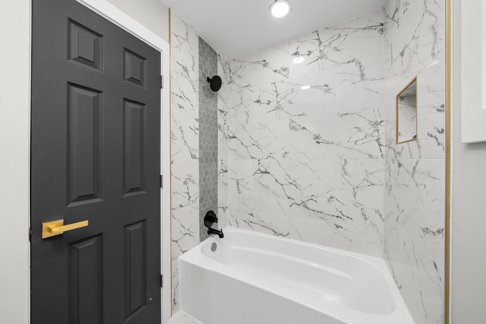 16619 Marshfield Avenue Markham, IL 60428 - Photo 15 of 41 a bathroom with a bathtub and shower