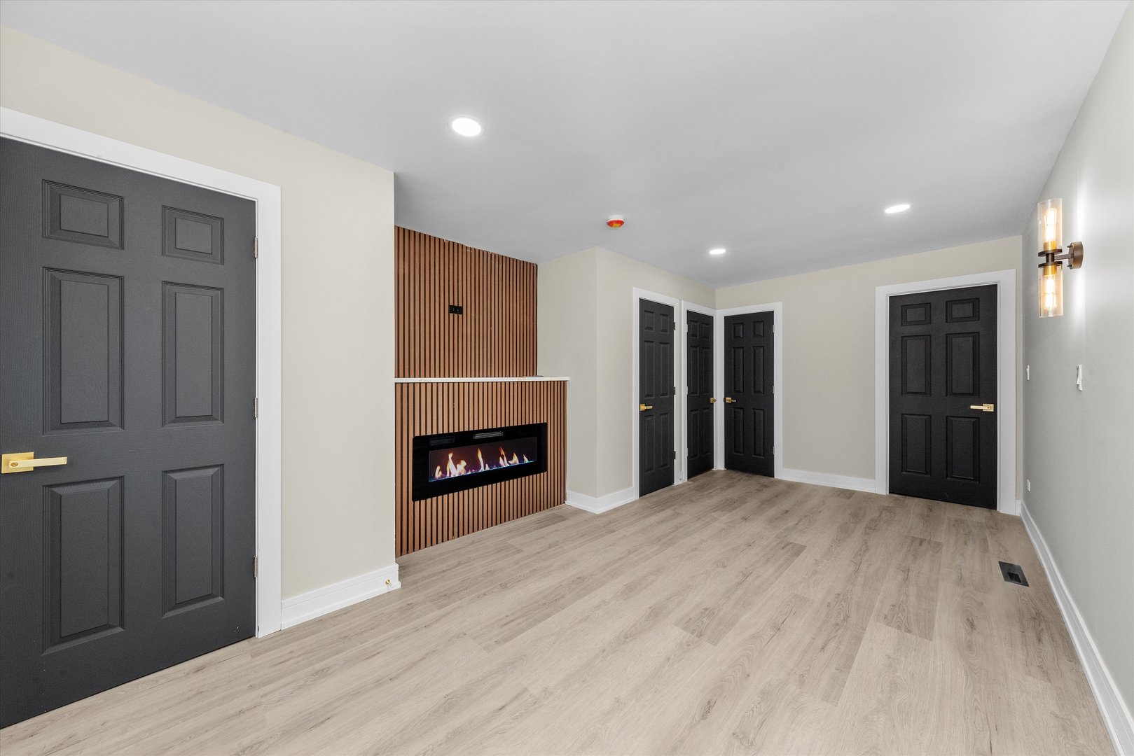 16619 Marshfield Avenue Markham, IL 60428 - Photo 25 of 41 a view of an empty room with wooden floor fireplace and a window