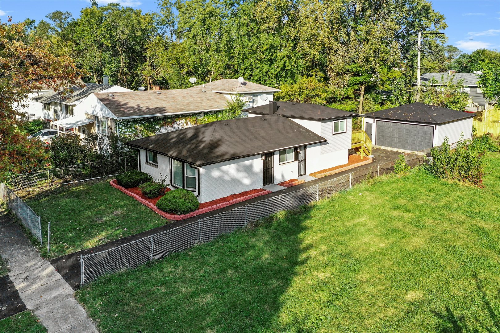 16619 Marshfield Avenue Markham, IL 60428 - Photo 30 of 41 an aerial view of a house with backyard