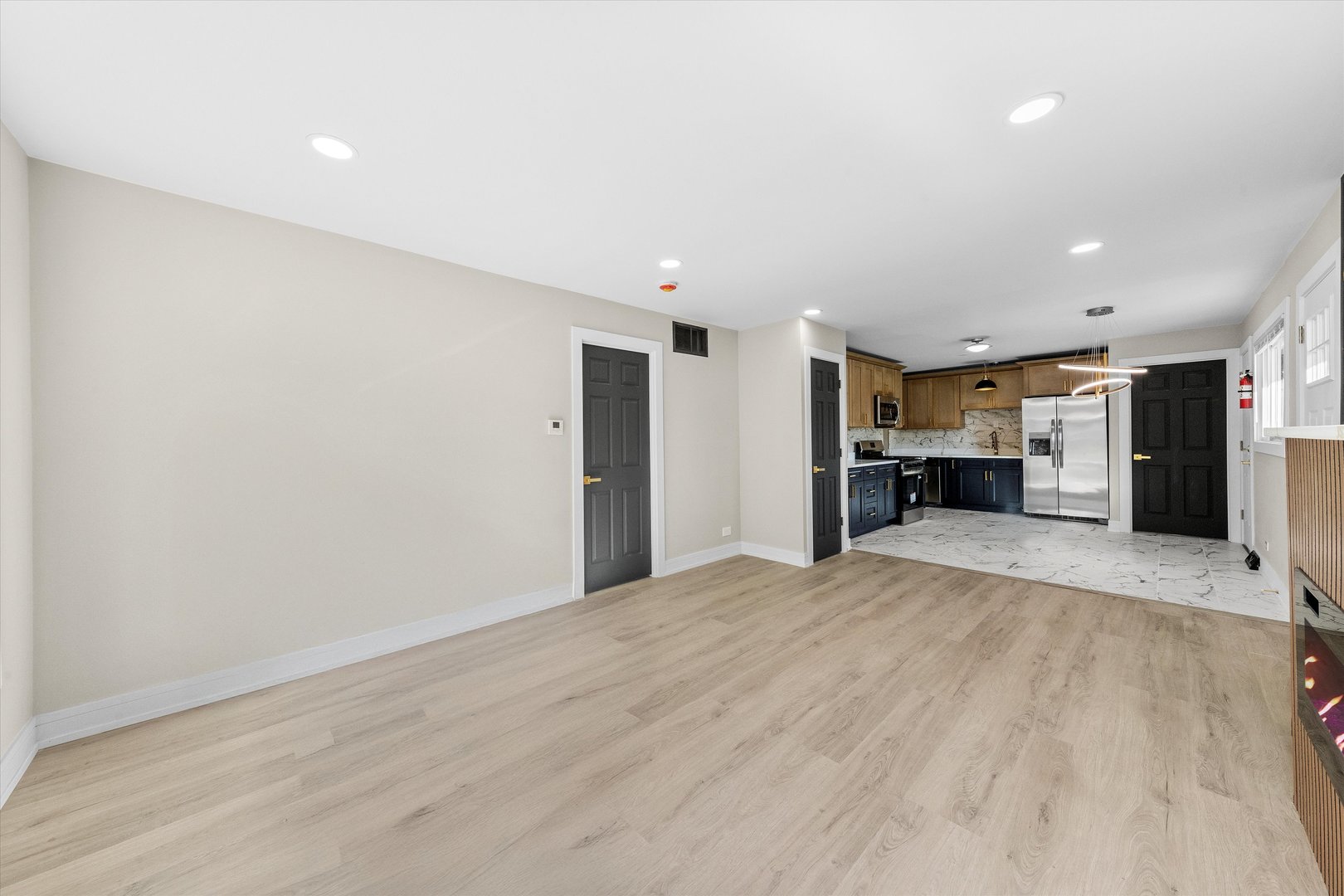 16619 Marshfield Avenue Markham, IL 60428 - Photo 5 of 41 a view of kitchen with furniture and a refrigerator