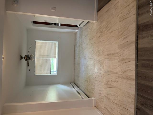 30 Tanager Road, Unit 3001 Monroe, NY 10950 - Photo 16 of 20 an empty room with windows