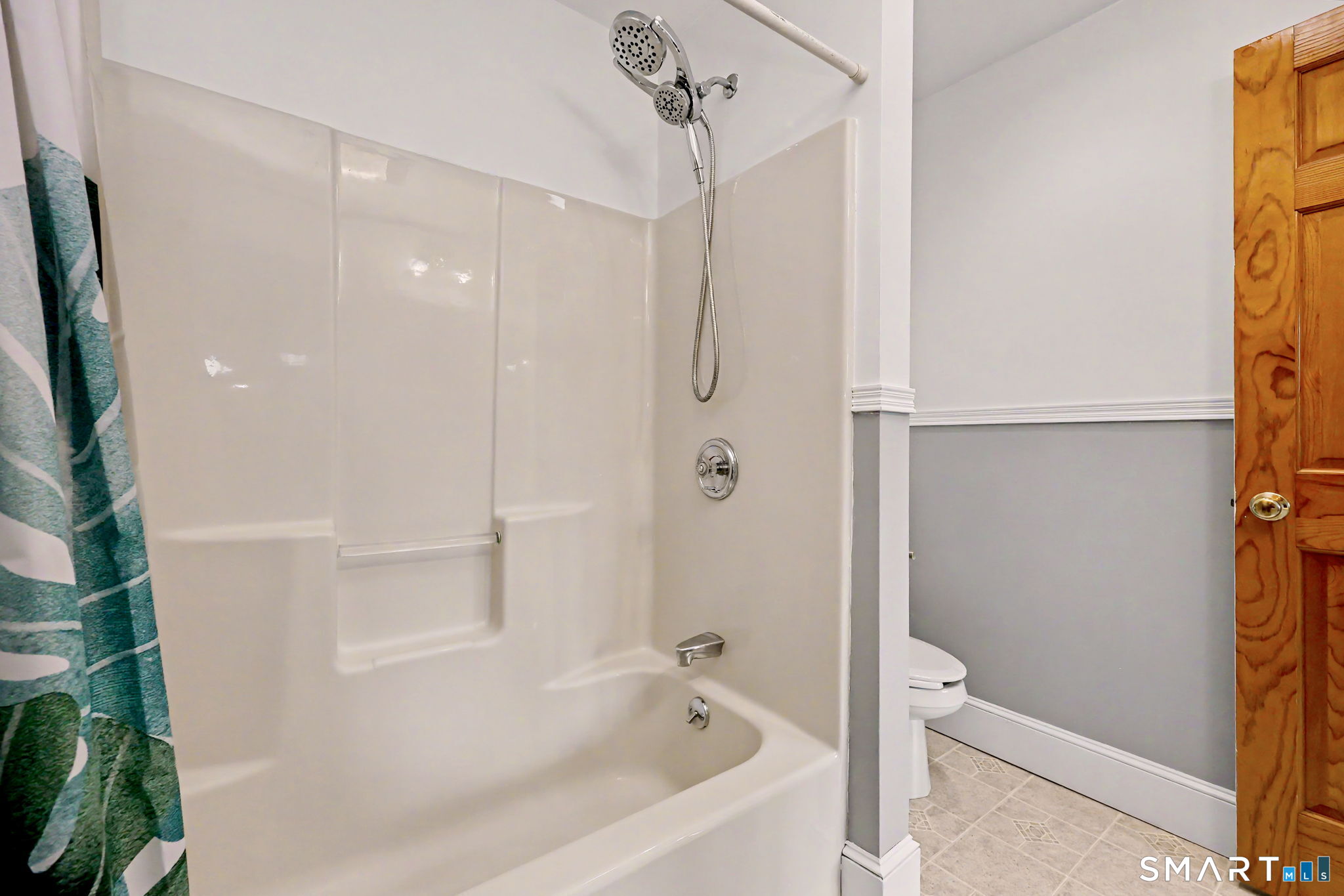 7 Merrill Road Trumbull, CT 06611 - Photo 32 of 40 a bathroom with a bathtub and a shower