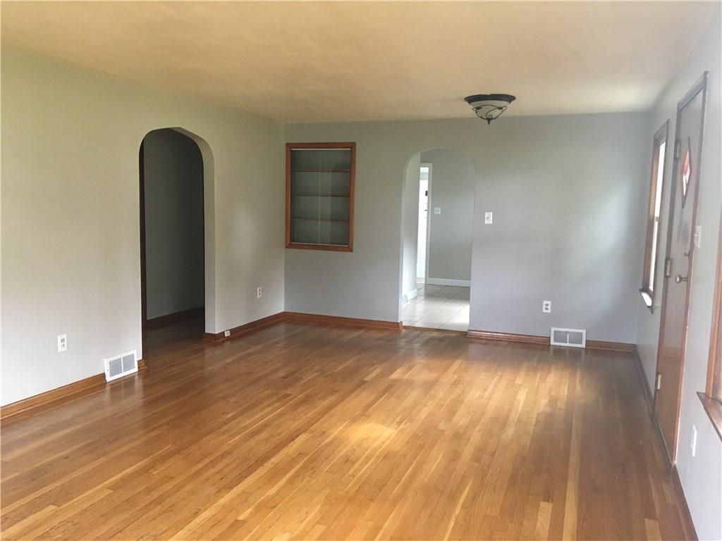 1110 Tuscarawas Road Beaver, PA 15009 - Photo 7 of 24 View of gleaming hardwood floors. Showing dining area.