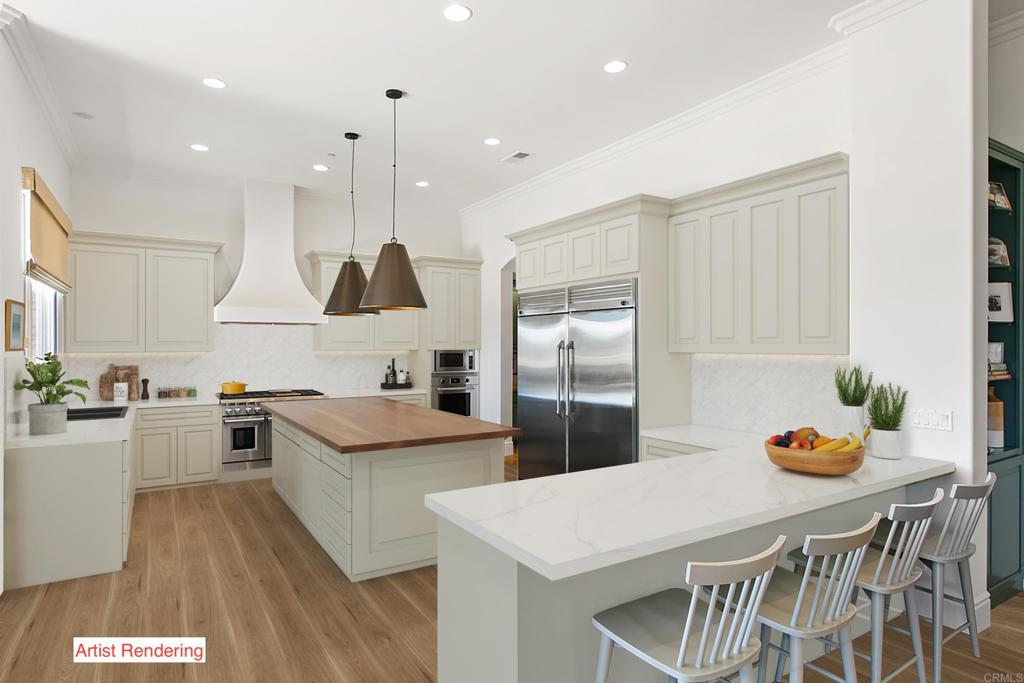18365 Old Coach Way Poway, CA 92064 - Photo 17 of 55 a kitchen with stainless steel appliances granite countertop a sink a stove a refrigerator and island with wooden floor