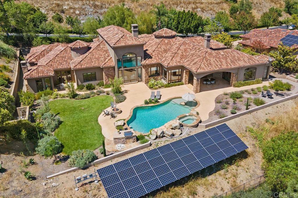 18365 Old Coach Way Poway, CA 92064 - Photo 51 of 55 a front view of a house with garden