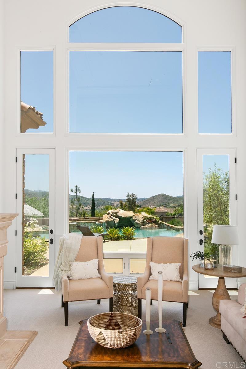 18365 Old Coach Way Poway, CA 92064 - Photo 7 of 55 a living room with furniture and a large window