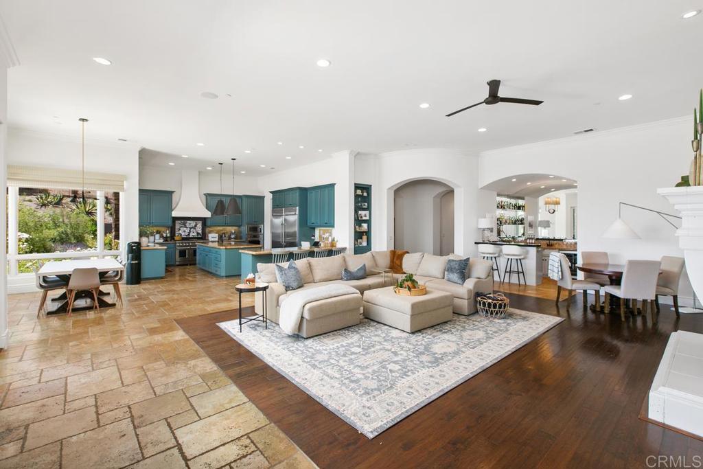 18365 Old Coach Way Poway, CA 92064 - Photo 8 of 55 a living room with fireplace furniture and a large window