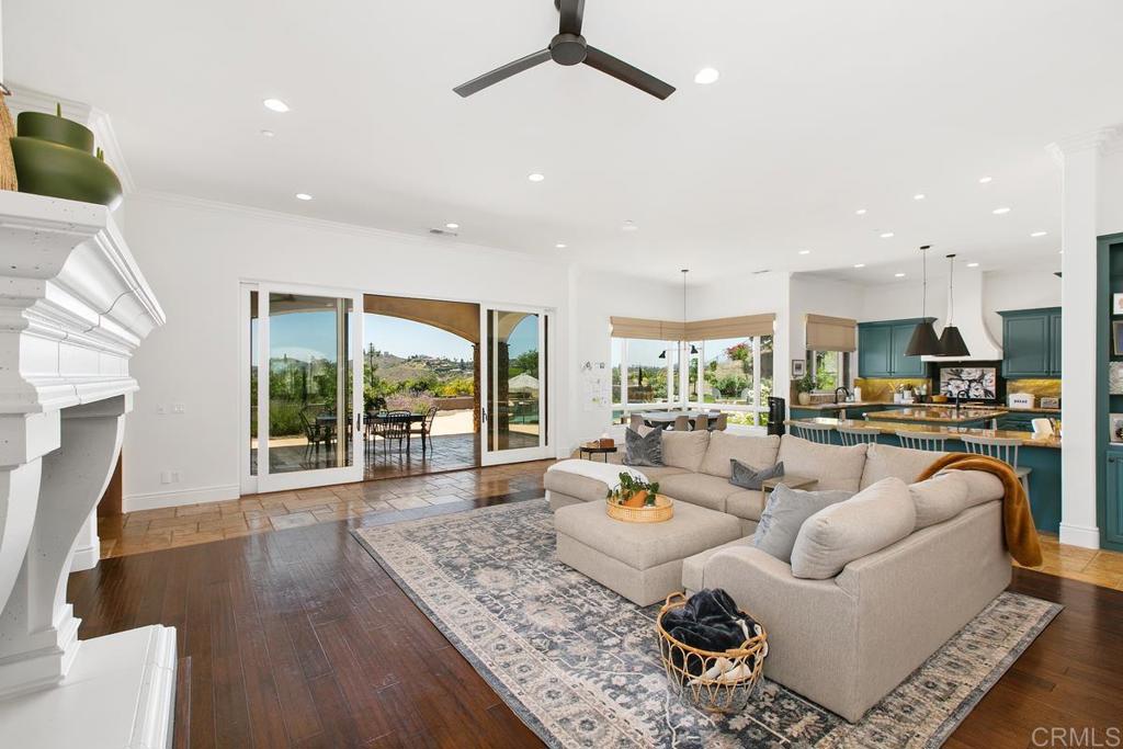 18365 Old Coach Way Poway, CA 92064 - Photo 10 of 55 a living room with furniture and a large window