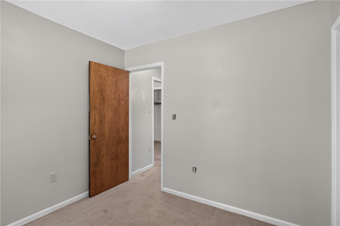 1412 Simpson Road Pendleton, SC 29670 - Photo 24 of 48 Well-maintained bedroom with neutral tones and durable carpeting, ready for personalization.