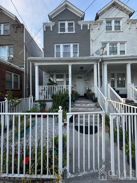 a front view of a house with a porch