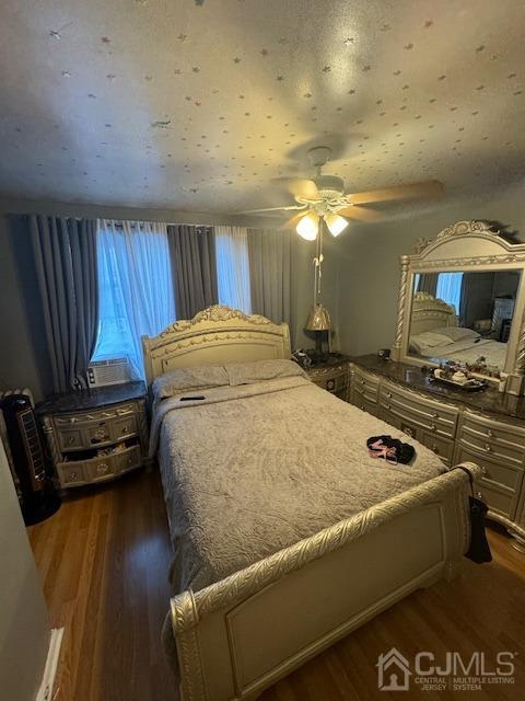 190 Lewis Street Perth Amboy, NJ 08861 - Photo 13 of 17 a room with furniture and wooden floor