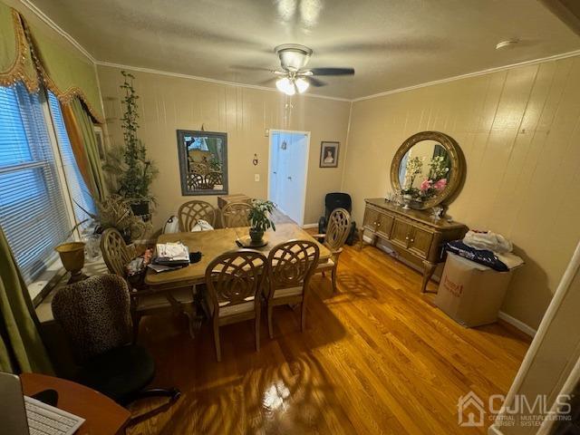 190 Lewis Street Perth Amboy, NJ 08861 - Photo 3 of 17 a view of a dining room with furniture and a chandelier