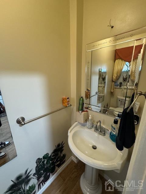 190 Lewis Street Perth Amboy, NJ 08861 - Photo 10 of 17 a bathroom with a sink and mirror