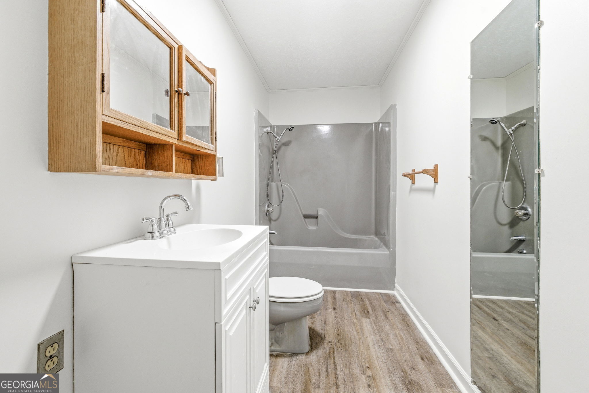 210 Kentucky Street Demorest, GA 30535 - Photo 23 of 30 a bathroom with a sink a toilet and shower
