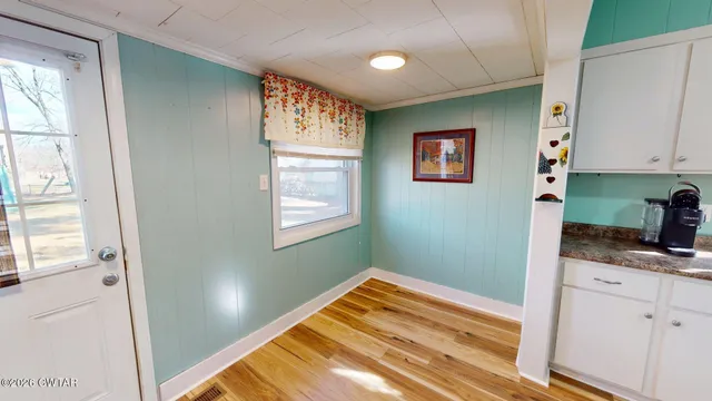 a view of kitchen and utility room