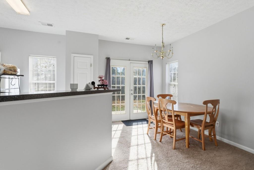 100 Benfield Circle Southeast Cartersville, GA 30121 - Photo 13 of 24 a dining room with furniture and window