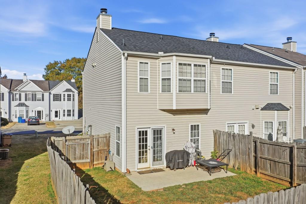 100 Benfield Circle Southeast Cartersville, GA 30121 - Photo 6 of 24 a view of a house with backyard
