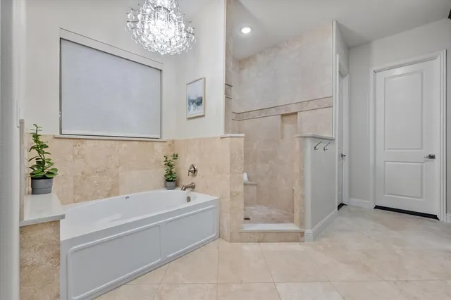 a living room with furniture a fireplace and a table