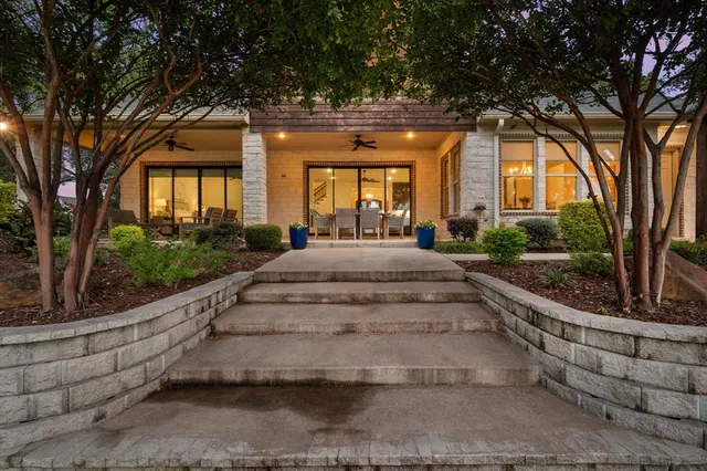 a view of a park with large trees