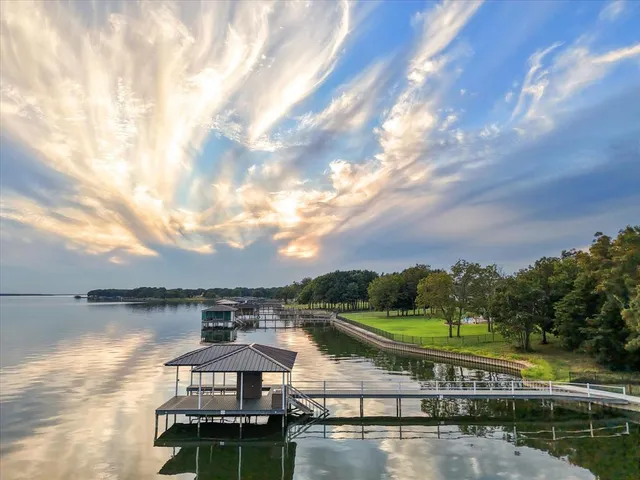 a view of a lake with a city from a lake