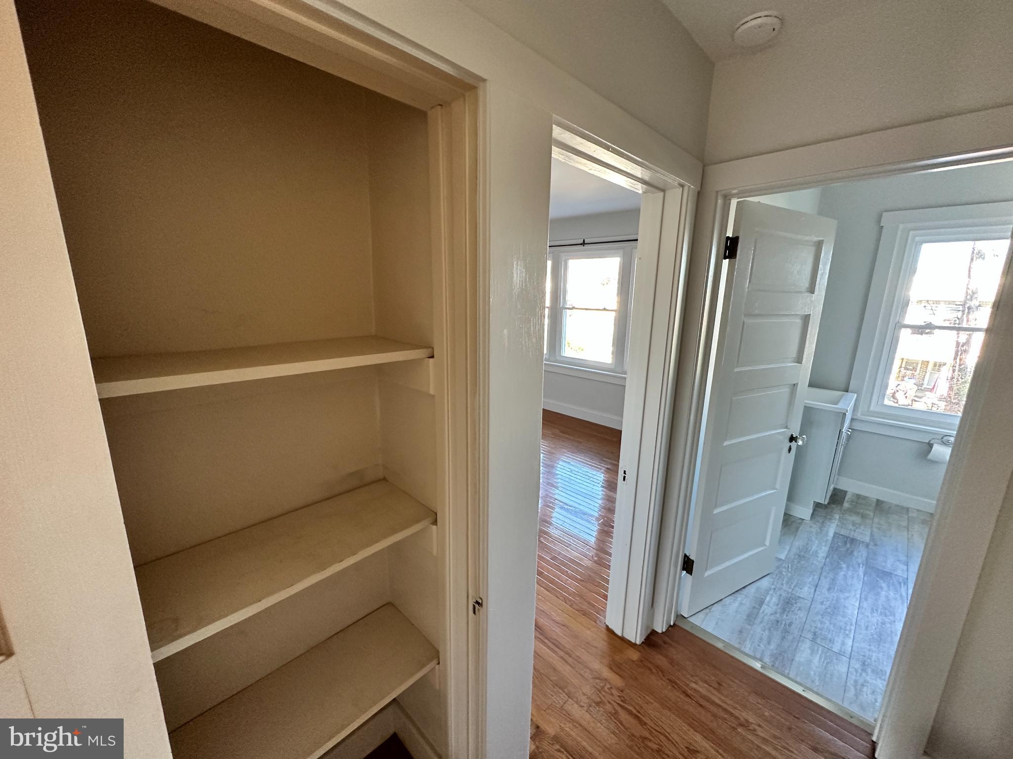 389 Oak Terrace Reading, PA 19611 - Photo 10 of 15 a room with wooden floor and a window