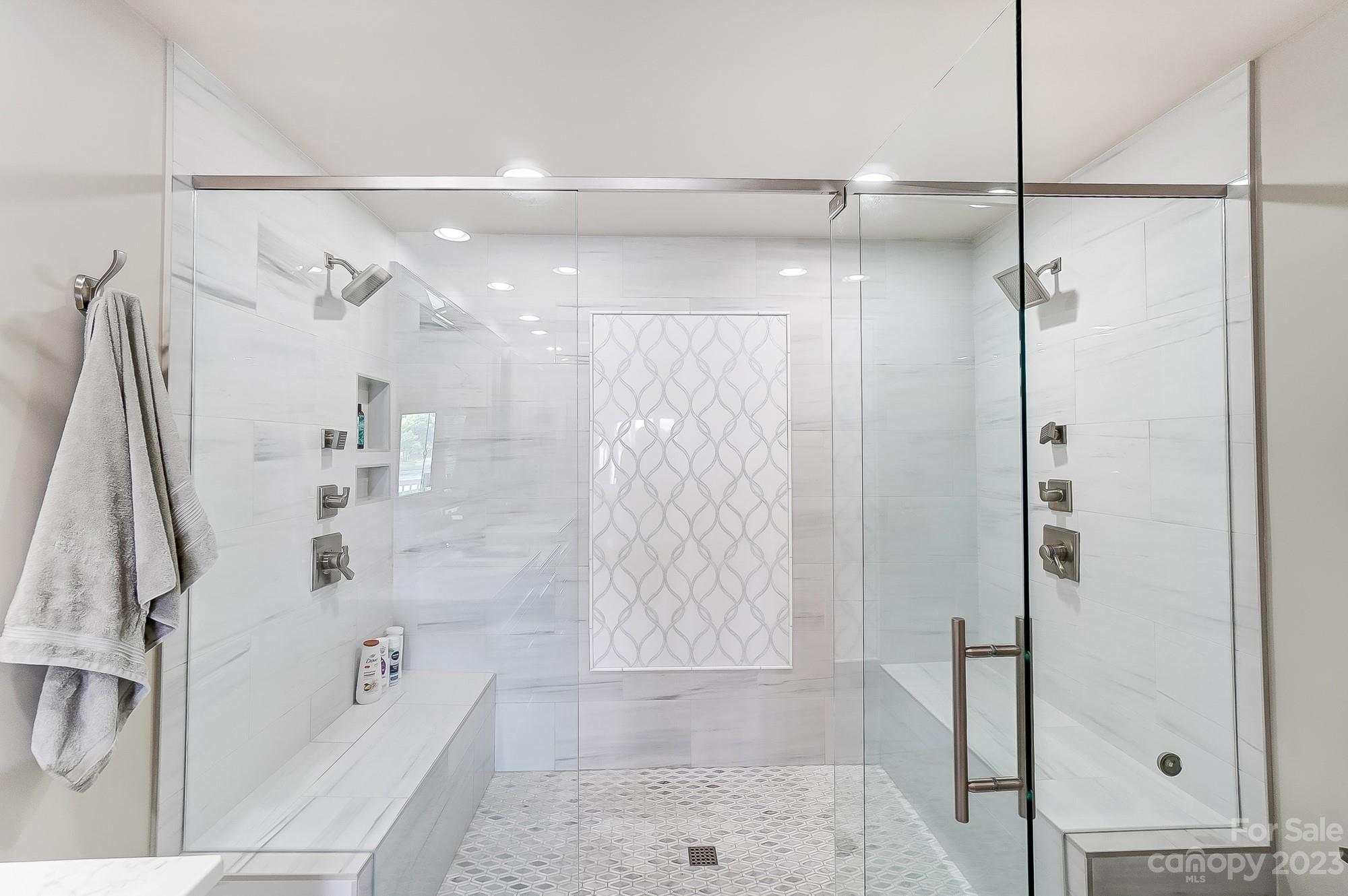 1230 Torrence Circle Davidson, NC 28036 - Photo 15 of 23 a bathroom with a tub shower and sink
