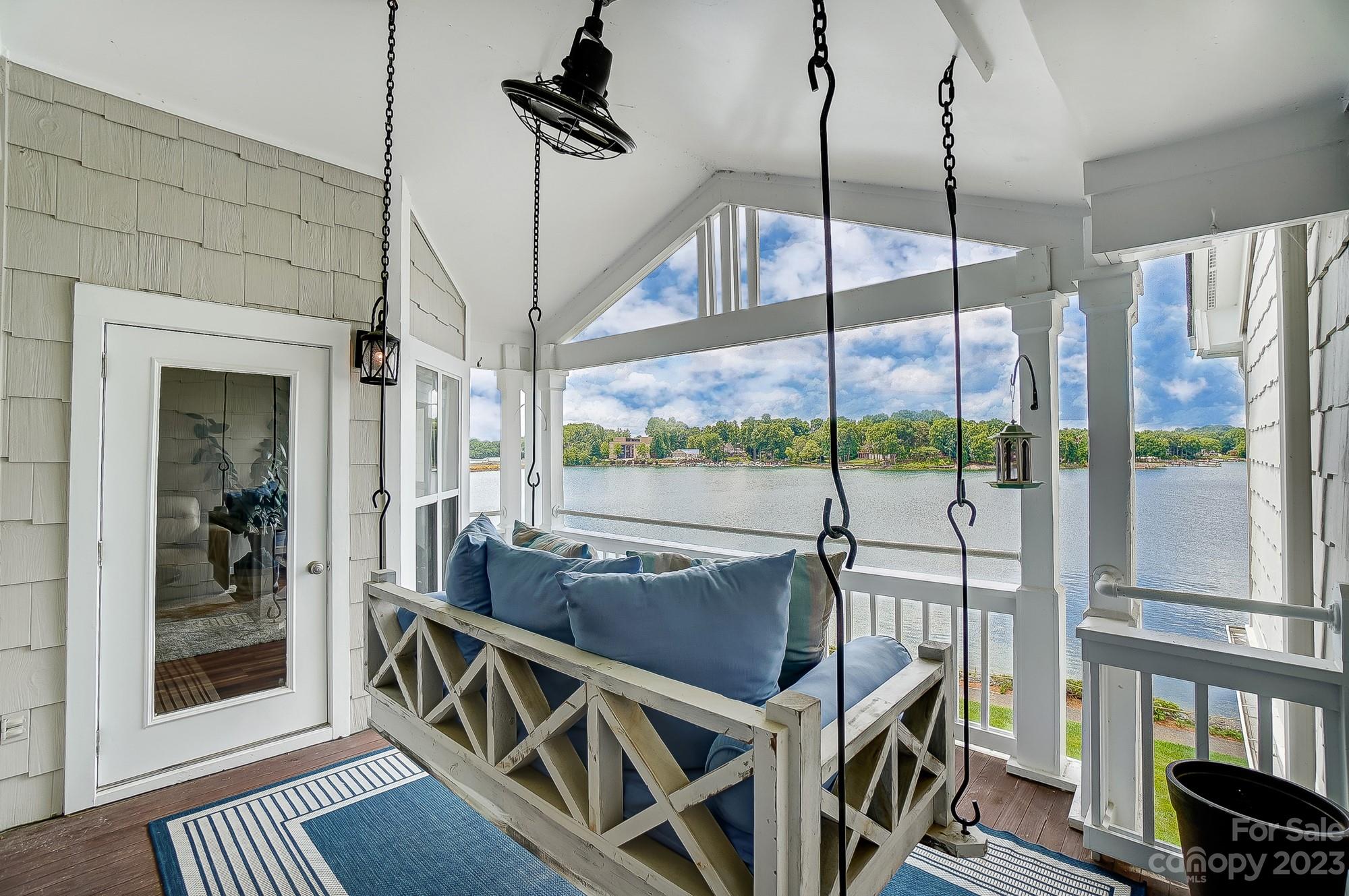 1230 Torrence Circle Davidson, NC 28036 - Photo 2 of 23 a view of a furniture from a balcony